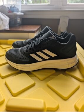 adidas Black Athletic Running Shoes with White Stripes